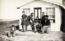 Five Civil War soldiers gathered on dirt porch outside home von American Photographer