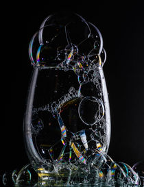 glass with bubbles on black number 2 by Tim Seward