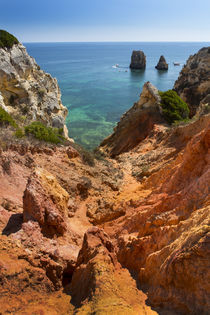 Coast with cliffs in Lagos at Algarve in Portugal by Bastian Linder