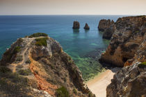 Coast with cliffs in Lagos at Algarve in Portugal by Bastian Linder