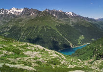 Mountain lake Lago di Pian Palu in the Alps, Italy by Bastian Linder