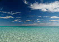Turquoise Ocean and Blue Sky with white clouds by Bastian Linder
