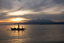 Sunrise above volcano Rinjani with fishing boat, Lombok by Bastian Linder