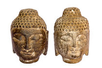 Pair of stone Buddha images isolated on a white background by Kevin Hellon