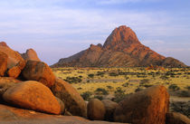 Rocky outcrop and plain, Spitzkoppe, Erongo, Namibia. by Danita Delimont