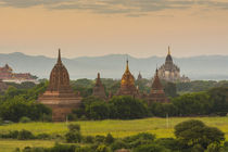 Bagan. Sunset over the temples of Bagan. by Danita Delimont