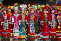 Dolls on display in Ethnic Native Dress, Kunming Ethnic Mino... by Danita Delimont