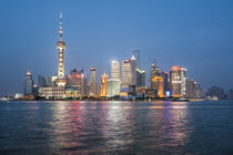 Pearl Tower over Pudong district skyline and Huangpu River S... by Danita Delimont