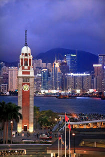 Hong Kong Clock Tower and Harbor at Night from Kowloon Ferry by Danita Delimont
