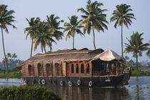Houseboat on the backwaters of Kerala, India by Danita Delimont