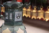 Smaller metal and gold lanterns are representations of their... von Danita Delimont