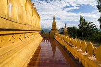 The hilltop stupa temple above Luang Namtha, Laos. by Danita Delimont