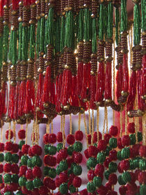 Beads hang in a store in Kathmandu, Nepal. by Danita Delimont