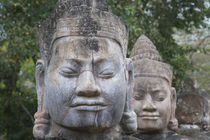 Buddhist statues at the South Gate of Angkor Thom, Cambodia,... by Danita Delimont