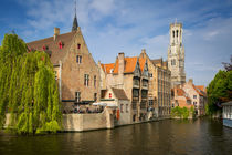 Belfry of Bruges towers over the buildings at the junction o... by Danita Delimont