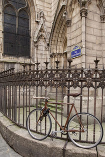 Bicycle chained to fence at Eglise Saint Severin in the Lati... by Danita Delimont