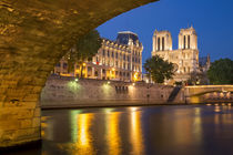 Twilight under Pont Saint Michel with Cathedral Notre Dame, ... by Danita Delimont