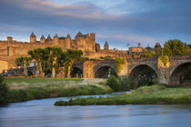 Setting sunlight over town of Carcassonne and River Aude, La... by Danita Delimont