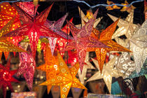 Hanging paper cutout star lamps, Christmas market, Heidelberg, Germany by Danita Delimont