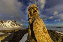 Wood carving of an ancient Viking at Vestrahorn, Mountain ne... by Danita Delimont