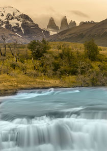 River and waterfall with Las Torres in background by Danita Delimont