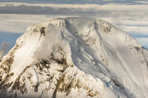 Aerial view Iliamna volcano rising up in Aleutian mountain r... by Danita Delimont