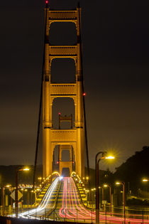 Early morning traffic on the Golden Gate Bridge in San Franc... by Danita Delimont