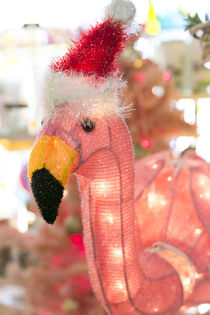 Antique Pink Flamingo with a Santa hat, Palm Springs, California, USA. by Danita Delimont