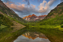 Maroon Bells reflect into calm Maroon Lake near Aspen, Colorado, USA. by Danita Delimont