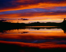USA, Colorado, Sunset ignites the sky over Echo Lake, Arapah... by Danita Delimont