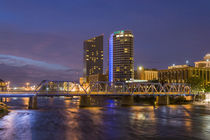 Skyline at dusk, on the Grand River, Grand Rapids, Michigan by Danita Delimont