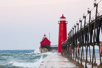 Grand Haven South Pier Lighthouse at sunrise on Lake Michiga... by Danita Delimont
