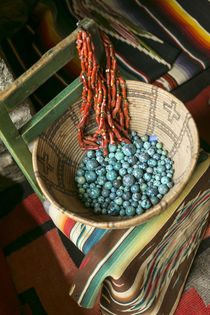 Basket containing round turquoise beads, Santa Fe, New Mexico, USA. by Danita Delimont