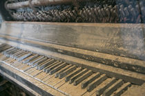 Antique piano, Ellis Island, New York, New York by Danita Delimont