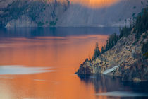 Sunset colors the waters at Crater Lake National Park, Oregon, USA by Danita Delimont