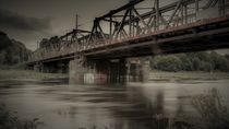 Die Brücke am Fluss by Bernhard Stiegler