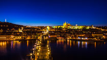 Night view of Prague castle and Charles Bridge  by Zoltan Duray