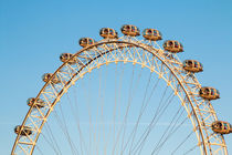 The London Eye against a cold blue winter sky by Chris Warham