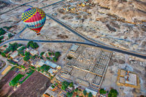 Hot Air Balloon at Sunrise in over Ruins in Luxor Egypt by Andy Doyle