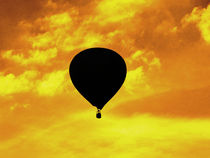 Balloon to gold sky by Stefan Herkenrath