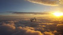 Cycling above the clouds by Dirk Hendriks