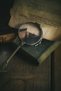 Still life with books and loupe by Jarek Blaminsky