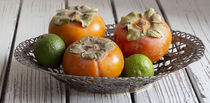 Fuyu Persimmons and Key Limes by Elisabeth  Lucas