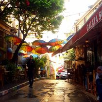 Colorful street after the rain by nessie