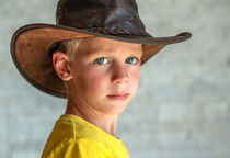 Young Blond Boy With LederHat by Eveline Toplak