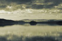 The cloudy sky is reflected in a smooth lake - duotone by Intensivelight Panorama-Edition