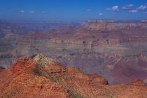 Red rocks of Grand Canyon with sun and blue sky, USA by Bastian Linder