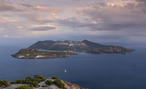 Panorama view to volcano island Vulcano from Lipari with dramatic clouds in the sky during sunset, Sicily Italy by Bastian Linder