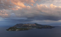 Panorama view to volcano island Vulcano from Lipari with dramatic clouds in the sky during sunset, Sicily Italy von Bastian Linder