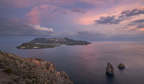 Panorama view to volcano island Vulcano from Lipari with dramatic clouds in the sky during sunset, Sicily Italy by Bastian Linder